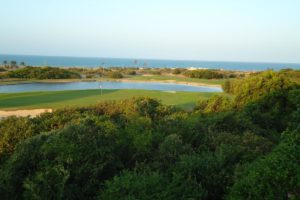 View on the perfect green of the course of the Aquiraz Riviera & Dunes golf club.