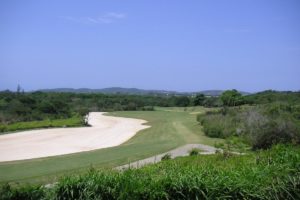 Bunker and fairway of the course of the Buzios golf club.